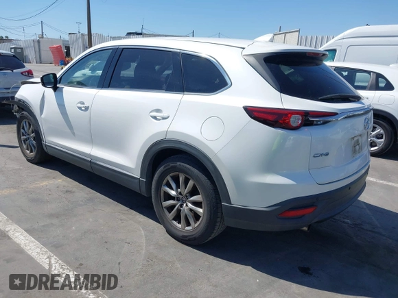 2019 Mazda CX-9 Touring with VIN JM3TCACY5K0306424, listed as a IAAI auction lot 42150466 with 95,166 mi miles and . Bid and sale history available at DreamBid. Image 3.