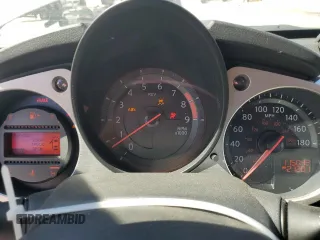 2014 Nissan 370Z Nismo with VIN JN1AZ4EH2EM633022, listed as a Copart auction lot 46947575 with 115,042 mi miles and Salvage Title. Bid and sale history available at DreamBid. Image 9.