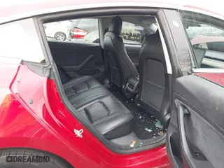 2018 Tesla Model 3 Long Range Battery with VIN 5YJ3E1EA4JF159743, listed as a IAAI auction lot 40839991 with 117,039 mi miles. Bid and sale history available at carsss.com. Image 8.