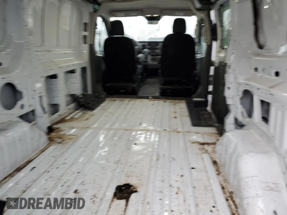 2021 Ford Transit Cargo с VIN 1FTBR1Y84MKA43992, выставлен на аукционе Copart как лот 54079785 с пробегом 66 124 миль миль и Списание • Salvage title. История ставок и продаж доступна на DreamBid. Изображение 10.