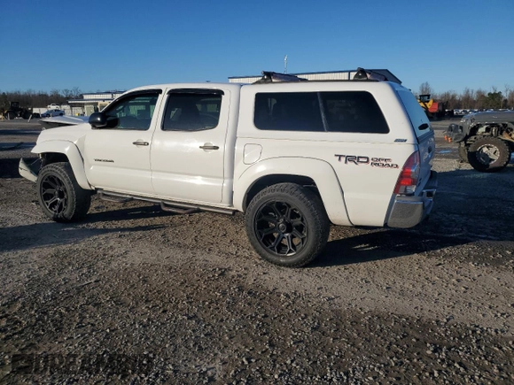 2015 Toyota Tacoma with VIN 5TFLU4EN9FX127195, listed as a Copart auction lot 41860035 with 127,078 mi miles and Salvage Title. Bid and sale history available at DreamBid. Image 2.