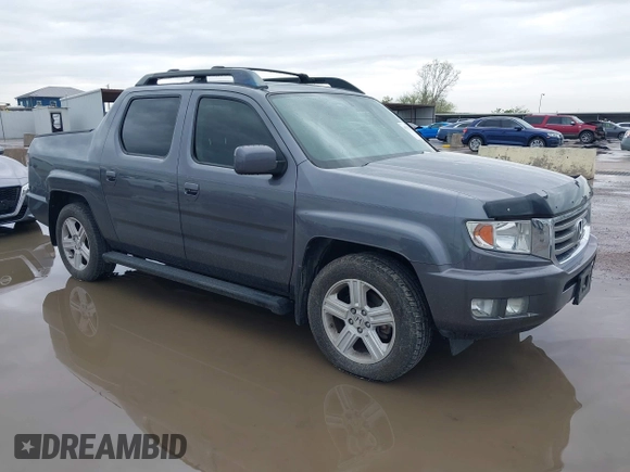 2014 Honda Ridgeline RTL with VIN 5FPYK1F50EB002577, listed as a IAAI auction lot 41931258 with 147,665 mi miles. Bid and sale history available at carsss.com. Image 1.