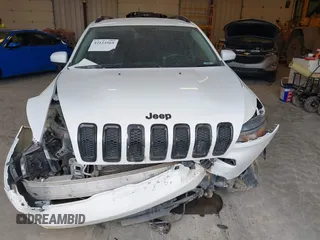 2018 Jeep Cherokee Latitude z VIN 1C4PJMCB3JD561285, wystawiony jako IAAI lot #42123569 z przebiegiem 151 886 mil mil oraz . Historia ofert i sprzedaży dostępna na DreamBid. Obrazek 12.