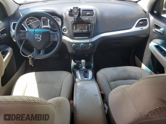 2015 Dodge Journey SXT with VIN 3C4PDCBG5FT628212, listed as a Copart auction lot 60663695 with 145,024 mi miles and Salvage title. Bid and sale history available at DreamBid. Image 8.