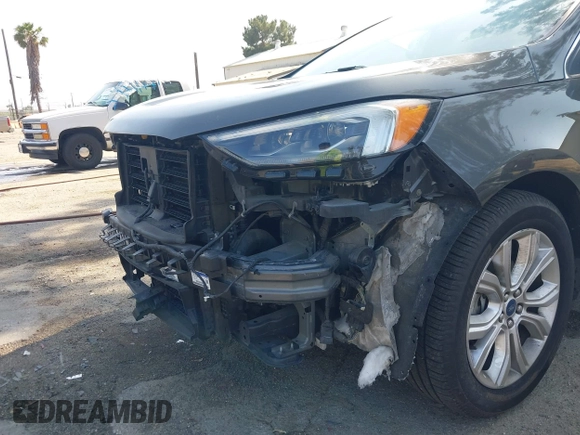2020 Ford Edge Titanium with VIN 2FMPK3K94LBB10568, listed as a IAAI auction lot 42430196 with 76,490 mi miles and . Bid and sale history available at DreamBid. Image 6.