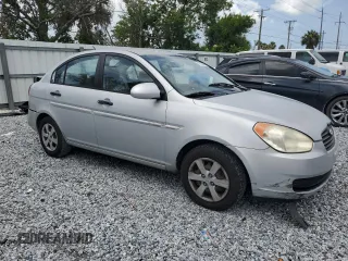 2009 Hyundai Accent Auto GLS z VIN KMHCN46C19U373167, wystawiony jako Copart lot #60026445 z przebiegiem 94 736 mil mil oraz Szkoda całkowita • Salvage title. Historia ofert i sprzedaży dostępna na DreamBid. Obrazek 4.