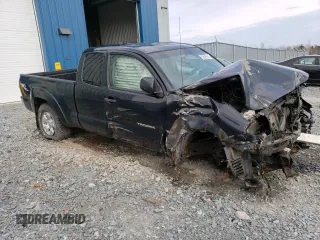2009 Toyota Tacoma with VIN 5TEUU42N39Z660570, listed as a Copart auction lot 52025513 with 106,815 mi miles and Salvage title. Bid and sale history available at DreamBid. Image 4.