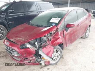 2017 Ford Fiesta SE z VIN 3FADP4BJ9HM159284, wystawiony jako IAAI lot #41291003 z przebiegiem 79 668 mil mil oraz . Historia ofert i sprzedaży dostępna na DreamBid. Obrazek 2.