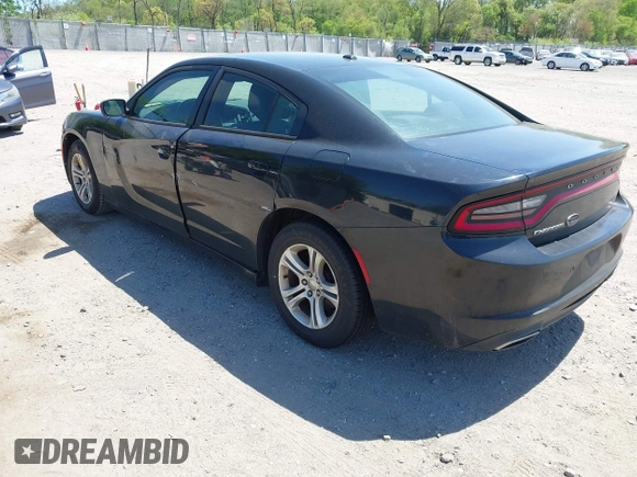 2015 Dodge Charger SE with VIN 2C3CDXBG9FH790573, listed as a IAAI auction lot 42142908 with 195,182 mi miles and . Bid and sale history available at carsss.com. Image 3.
