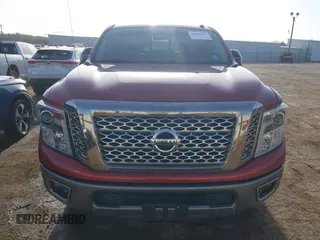 2017 Nissan Titan Pro-4X z VIN 1N6BA1F43HN562377, wystawiony jako IAAI lot #41786607 z przebiegiem 95 207 mil mil oraz . Historia ofert i sprzedaży dostępna na DreamBid. Obrazek 13.