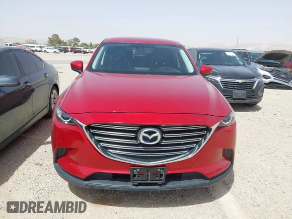 2016 Mazda CX-9 Touring z VIN JM3TCACY9G0102524, wystawiony jako IAAI lot #42305452 z przebiegiem 76 892 mil mil oraz . Historia ofert i sprzedaży dostępna na DreamBid. Obrazek 12.