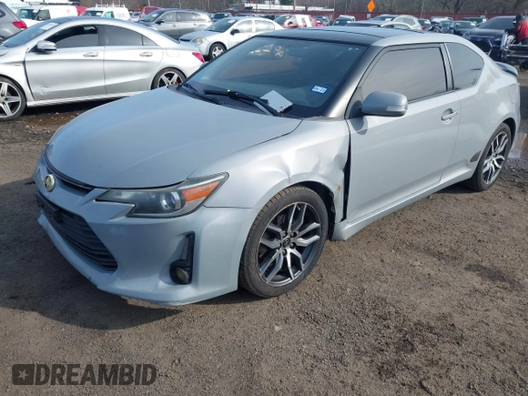 2014 Scion tC z VIN JTKJF5C71E3081033, wystawiony jako IAAI lot #41928949 z przebiegiem 144 112 mil mil oraz . Historia ofert i sprzedaży dostępna na DreamBid. Obrazek 6.