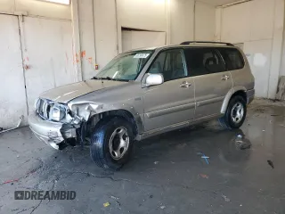 2002 Suzuki XL7 Standard z VIN JS3TX92V324121687, wystawiony jako Copart lot #88299375 z przebiegiem 228 833 mil mil oraz Szkoda całkowita • Salvage title. Historia ofert i sprzedaży dostępna na DreamBid. Obrazek 1.