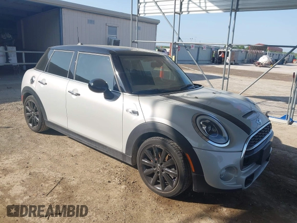 2015 MINI Hardtop 4 Door S z VIN WMWXU3C55F2B66314, wystawiony jako IAAI lot #42211312 z przebiegiem 101 395 mil mil oraz . Historia ofert i sprzedaży dostępna na DreamBid. Obrazek 1.
