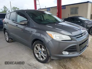 2013 Ford Escape SEL with VIN 1FMCU0HX8DUB61208, listed as a IAAI auction lot 42575283 with 140,330 mi miles and . Bid and sale history available at DreamBid. Image 1.