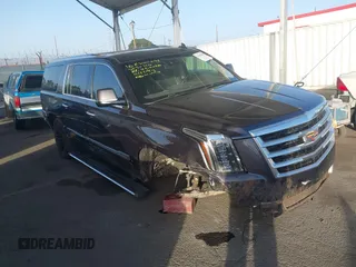 2016 Cadillac Escalade ESV Premium Collection z VIN 1GYS4JKJOGR175969, wystawiony jako IAAI lot #41266103 z przebiegiem 168 517 mil mil oraz . Historia ofert i sprzedaży dostępna na DreamBid. Obrazek 1.