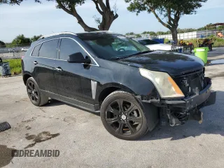 2015 Cadillac SRX Performance Collection with VIN 3GYFNCE32FS558430, listed as a Copart auction lot 63633865 with 153,729 mi miles and Salvage title. Bid and sale history available at DreamBid. Image 4.