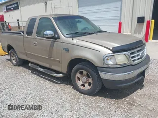 1999 Ford F-150 XL z VIN 1FTRX17LXXNB88516, wystawiony jako IAAI lot #42400493 z przebiegiem 254 085 mil mil oraz . Historia ofert i sprzedaży dostępna na DreamBid. Obrazek 1.