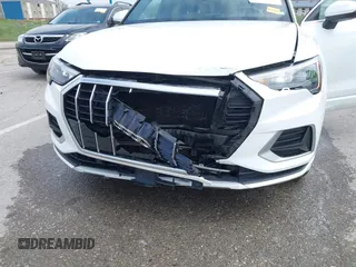 2021 Audi Q3 Premium with VIN WA1AUCF33M1096437, listed as a IAAI auction lot 41910411 with 86,837 mi miles and . Bid and sale history available at DreamBid. Image 6.