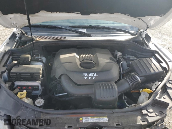 2013 Jeep Grand Cherokee Overland with VIN 1C4RJECG8DC526150, listed as a Copart auction lot 52038775 with 183,813 mi miles and Salvage Title. Bid and sale history available at DreamBid. Image 13.