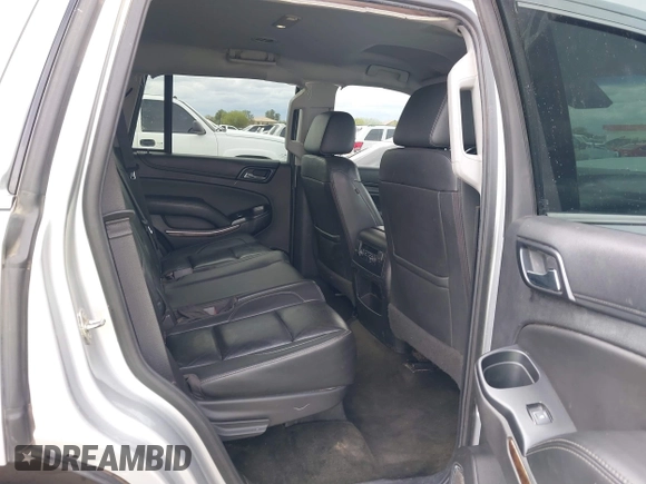 2018 Chevrolet Tahoe LT with VIN 1GNSCBKC2JR115318, listed as a IAAI auction lot 41809253 with 107,217 mi miles and . Bid and sale history available at DreamBid. Image 8.