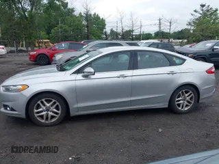 2016 Ford Fusion SE z VIN 3FA6P0H72GR120891, wystawiony jako IAAI lot #42364227 z przebiegiem 234 532 mil mil oraz . Historia ofert i sprzedaży dostępna na DreamBid. Obrazek 14.