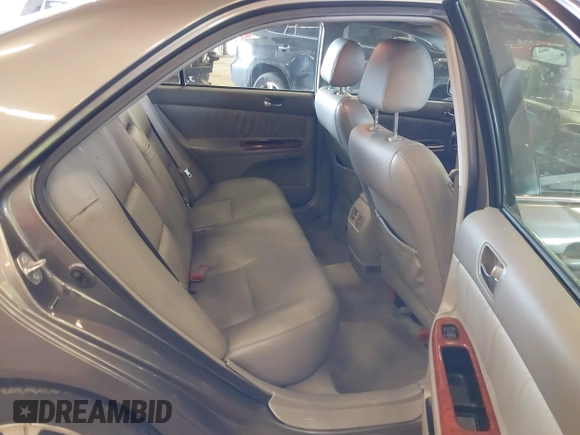 2005 Toyota Camry LE with VIN 4T1BF30K15U591137, listed as a IAAI auction lot 41681990 with 231,555 mi miles and . Bid and sale history available at DreamBid. Image 8.