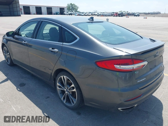 2020 Ford Fusion Titanium with VIN 3FA6P0D9XLR131042, listed as a IAAI auction lot 42560444 with 95,351 mi miles and . Bid and sale history available at DreamBid. Image 3.