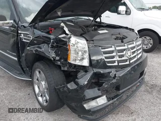 2009 Cadillac Escalade z VIN 1GYFC23249R116363, wystawiony jako IAAI lot #39887498 z przebiegiem 140 095 mil mil oraz . Historia ofert i sprzedaży dostępna na DreamBid. Obrazek 6.