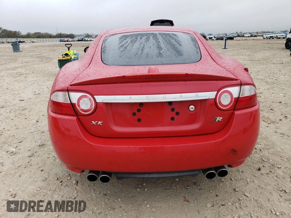 2007 Jaguar XK with VIN SAJWA43C379B19952, listed as a Copart auction lot 85141054 with 49,599 mi miles and Salvage Title. Bid and sale history available at carsss.com. Image 6.