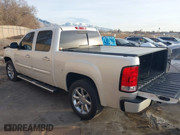 2011 GMC Sierra 1500 Denali z VIN 3GTP2XE20BG152905, wystawiony jako IAAI lot #41079419 z przebiegiem 158 192 mil mil oraz . Historia ofert i sprzedaży dostępna na DreamBid. Obrazek 3.