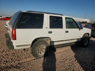 1999 Chevrolet Tahoe Z71 with VIN 1GNEK13R9XJ381424, listed as a Copart auction lot 79940494 with 164,231 mi miles and Salvage Title. Bid and sale history available at carsss.com. Image 3.