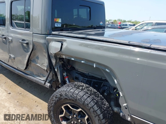 2021 Jeep Gladiator Rubicon with VIN 1C6JJTBG2ML515932, listed as a IAAI auction lot 42471704 with 57,775 mi miles and . Bid and sale history available at DreamBid. Image 6.