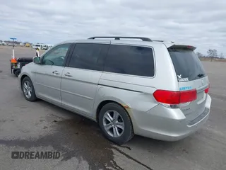 2008 Honda Odyssey Touring with VIN 5FNRL38928B109012, listed as a IAAI auction lot 41922712 with 241,589 mi miles. Bid and sale history available at carsss.com. Image 3.
