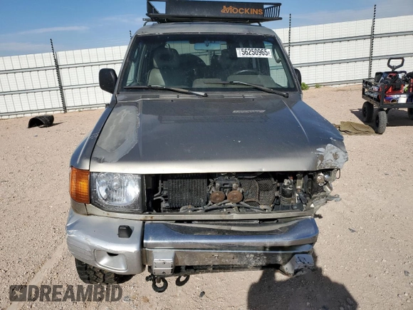 1998 Mitsubishi Montero z VIN JA4MR51R0WJ000921, wystawiony jako Copart lot #56250965 z przebiegiem 181 293 mil mil oraz Szkoda całkowita • Salvage title. Historia ofert i sprzedaży dostępna na DreamBid. Obrazek 5.