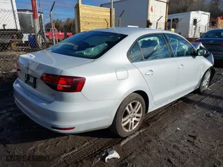 2017 Volkswagen Jetta 1.4T S with VIN 3VW167AJ9HM215563, listed as a IAAI auction lot 41473283 with 119,648 mi miles. Bid and sale history available at carsss.com. Image 4.