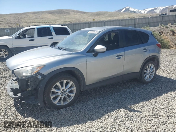 2015 Mazda CX-5 Grand Touring with VIN JM3KE4DY5F0540655, listed as a Copart auction lot 52893155 with 152,279 mi miles and Salvage Title. Bid and sale history available at carsss.com. Image 1.