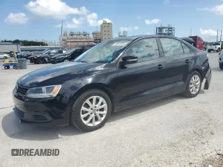 2012 Volkswagen Jetta SE with VIN 3VWDX7AJ3CM338441, listed as a Copart auction lot 60853055 with 151,075 mi miles and Salvage title. Bid and sale history available at DreamBid. Image 1.