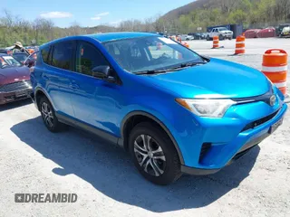 2018 Toyota RAV4 LE with VIN JTMZFREV4JJ734702, listed as a IAAI auction lot 41987540 with 141,526 mi miles. Bid and sale history available at carsss.com. Image 1.