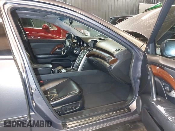2006 Acura RL z VIN JH4KB165X6C009547, wystawiony jako IAAI lot #42073784 z przebiegiem 190 601 mil mil oraz . Historia ofert i sprzedaży dostępna na DreamBid. Obrazek 5.