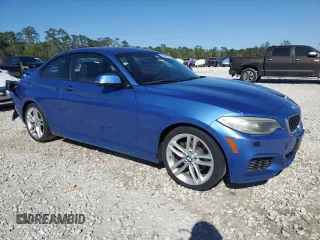 2015 BMW 2 Series 228i with VIN WBA1F5C50FV256672, listed as a Copart auction lot 50062235 with 120,213 mi miles and Salvage Title. Bid and sale history available at carsss.com. Image 4.