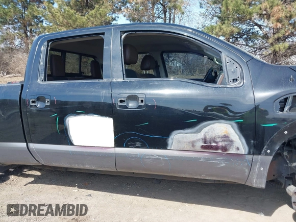 2016 Nissan Titan XD Platinum Reserve with VIN 1N6BA1F27GN506410, listed as a IAAI auction lot 41768621 with 159,404 mi miles. Bid and sale history available at carsss.com. Image 14.