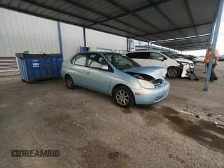 2003 Toyota Prius z VIN JT2BK18U130088117, wystawiony jako Copart lot #57264675 z przebiegiem 185 926 mil mil oraz Szkoda całkowita • Salvage title. Historia ofert i sprzedaży dostępna na DreamBid. Obrazek 13.