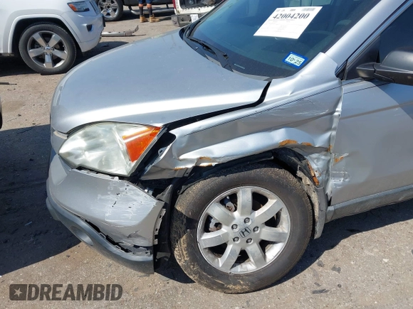 2009 Honda CR-V EX with VIN 3CZRE38559G705051, listed as a IAAI auction lot 42004200 with 185,218 mi miles and . Bid and sale history available at carsss.com. Image 6.