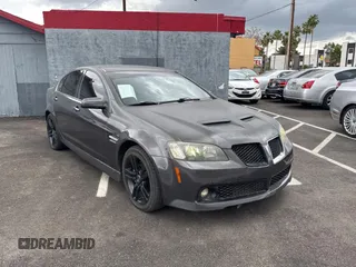 2009 Pontiac G8 with VIN 6G2ER57779L157359, listed as a Copart auction lot 56220095 with 114,020 mi miles and Clean Title. Bid and sale history available at DreamBid. Image 1.