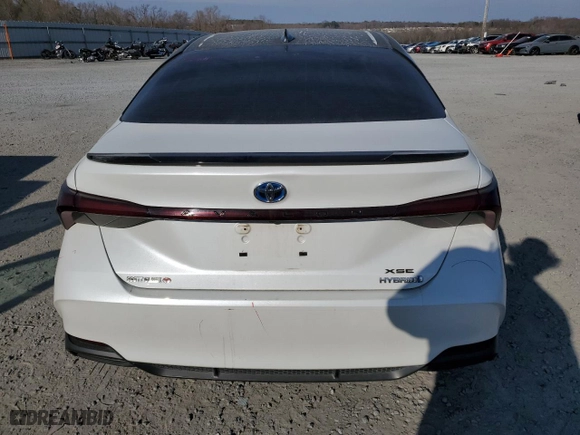 2019 Toyota Avalon Hybrid Limited with VIN 4T1B21FB9KU006159, listed as a Copart auction lot 43402355 with 129,787 mi miles and Salvage Title. Bid and sale history available at carsss.com. Image 6.