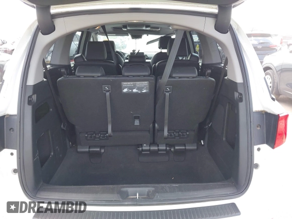 2023 Honda Odyssey Touring with VIN 5FNRL6H8XPB038875, listed as a IAAI auction lot 42441076 with 13,947 mi miles and . Bid and sale history available at DreamBid. Image 17.