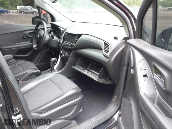 2021 Chevrolet Trax LT with VIN KL7CJLSB5MB322117, listed as a IAAI auction lot 42161568 with 63,344 mi miles and . Bid and sale history available at DreamBid. Image 5.