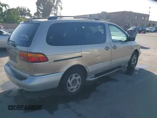 2000 Toyota Sienna LE with VIN 4T3ZF13C9YU189305, listed as a IAAI auction lot 42201168 with 218,254 mi miles and . Bid and sale history available at DreamBid. Image 4.