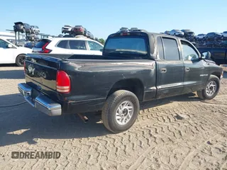 2000 Dodge Dakota Sport with VIN 1B7GL2AN2YS776819, listed as a IAAI auction lot 42066658 with 250,880 mi miles. Bid and sale history available at carsss.com. Image 4.
